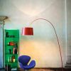 Foscarini | Twiggy | Betonwand mit blauem Sessel | Leuchten Lukassen Lichtdesign
